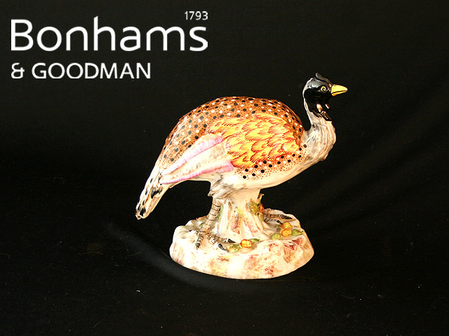 Appraisal: A Paris porcelain model of an exotic bird on a