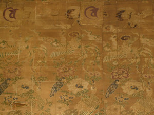 Appraisal: A Chinese woven textile possibly th century depicting peacocks and