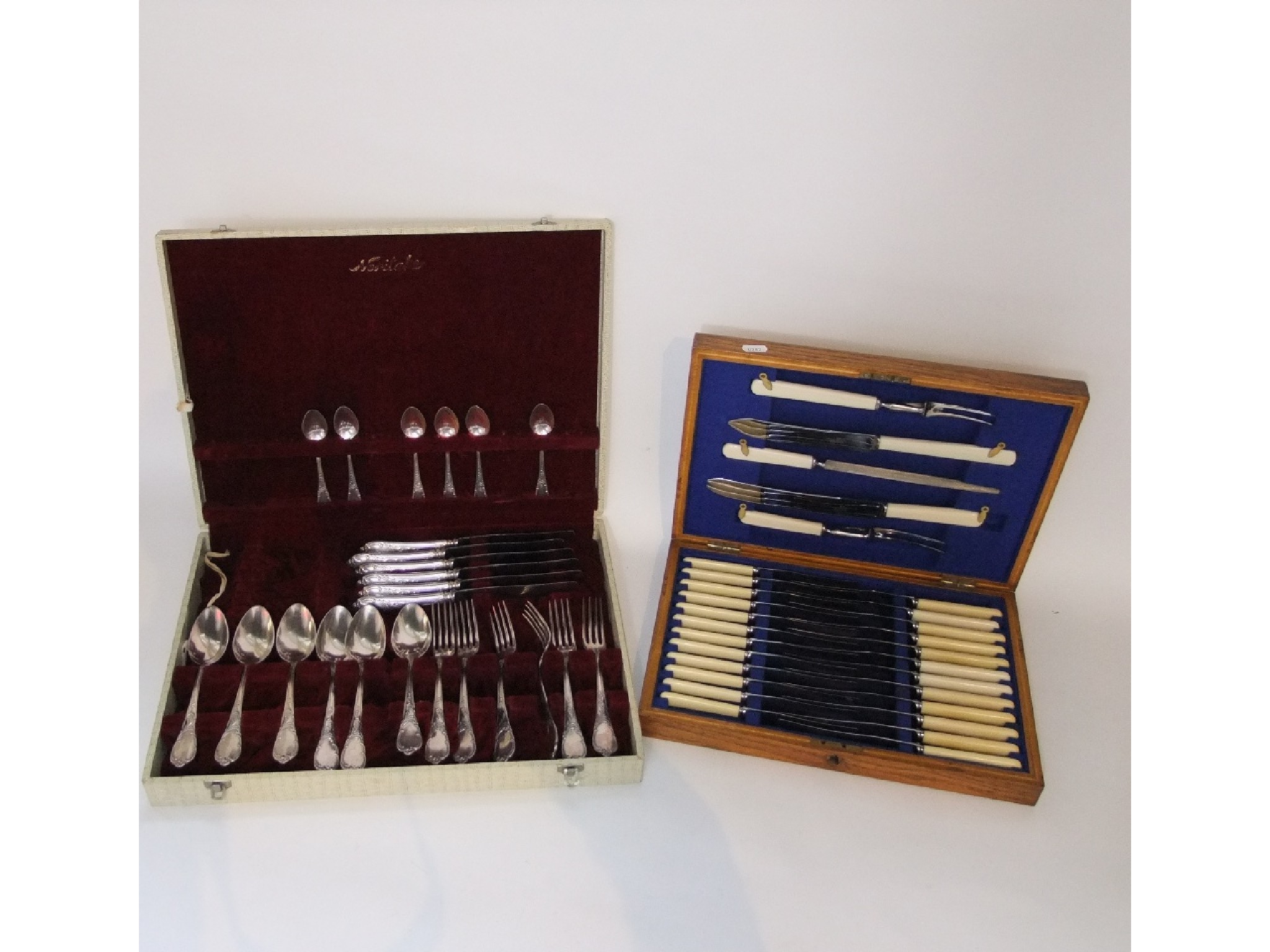 Appraisal: An oak cased set of silver plated flatware cutlery by