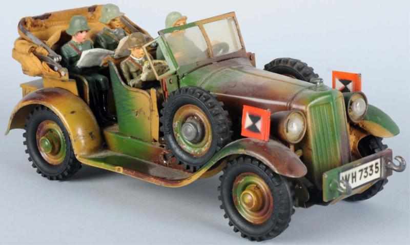 Appraisal: Hausser Camouflage K belwagen Working clockwork Electric lights A little