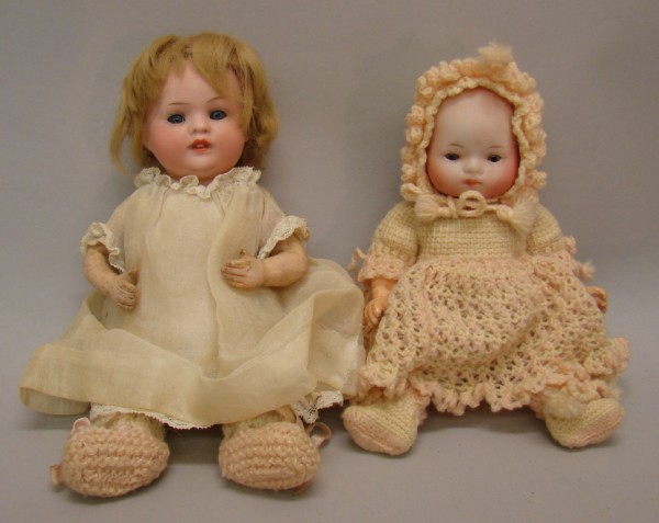 Appraisal: Pair of dolls Germany Blue sleep eyes pc papier mache