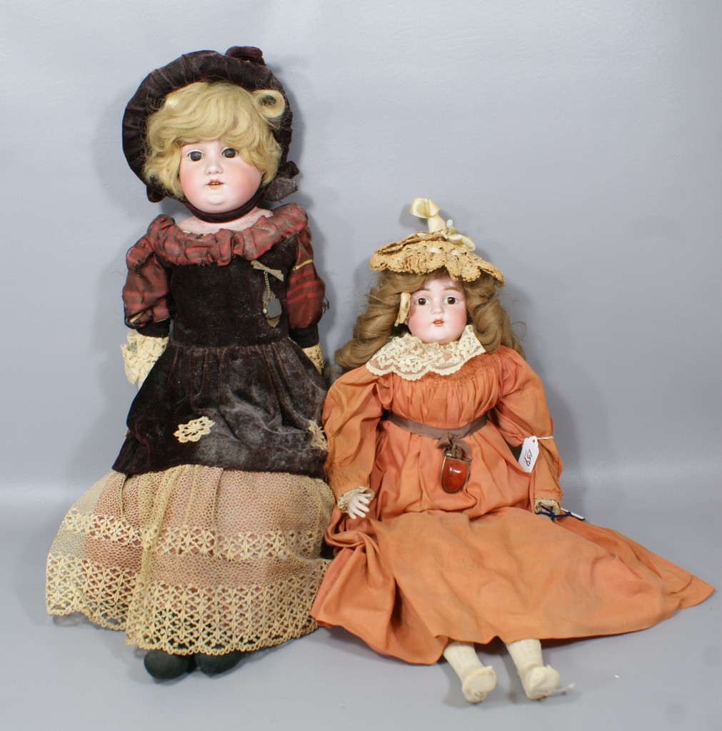 Appraisal: German Bisque Shoulder Head Dolls larger is incised Floradora A