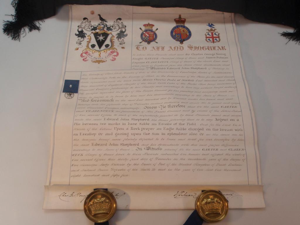 Appraisal: A Victorian letter patent bestowing coats of arms to Edward