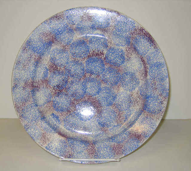 Appraisal: ENGLISH SPATTERWARE Blue and red thumbprint spatter dinner plate Diameter