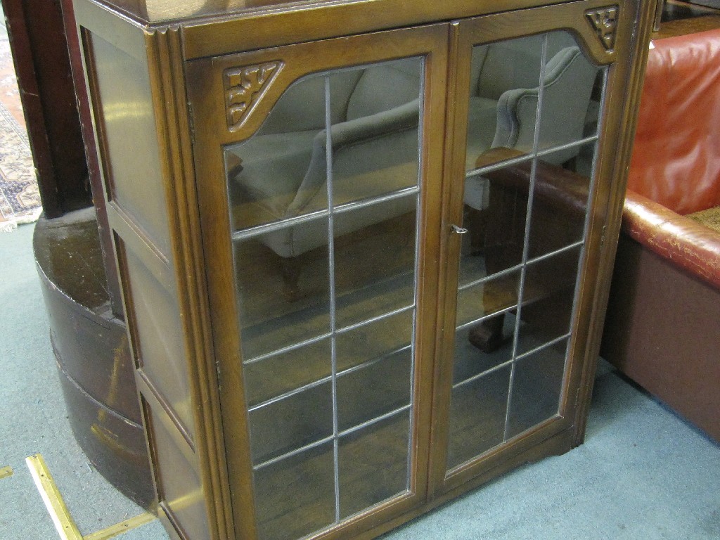 Appraisal: Leaded glazed door bookcase