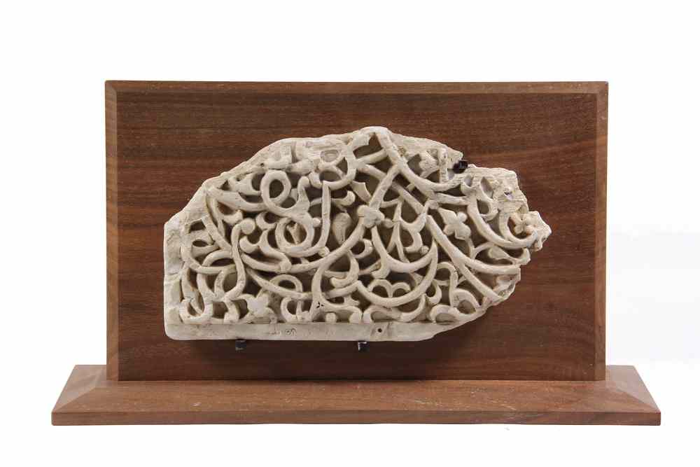 Appraisal: ISLAMIC STONE CARVING- fragmentary part of a larger panel featuring