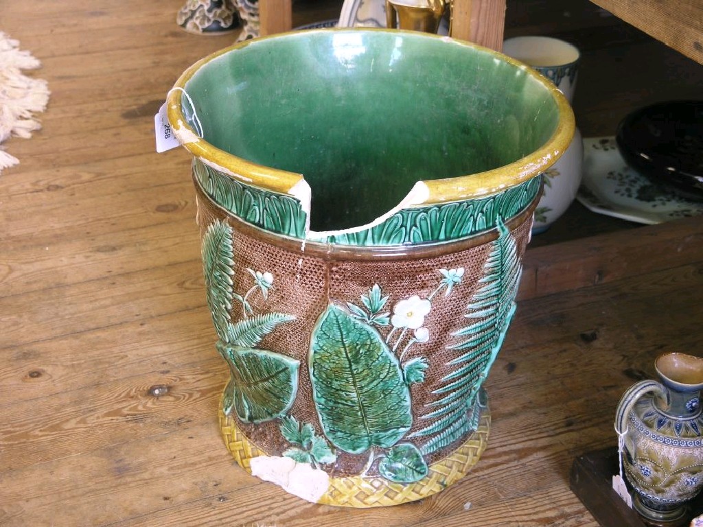 Appraisal: A th century majolica jardiniere moulded with fern leaves and