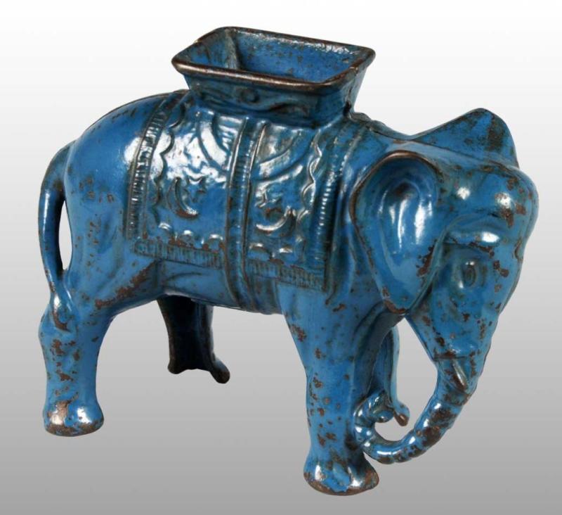 Appraisal: Cast Iron Large Elephant with Howdah Still Bank Description Manufactured