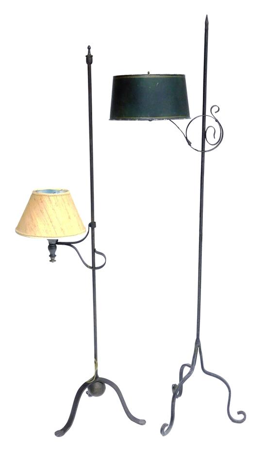 Appraisal: Pair of Colonial style iron floor lamps electrified both with