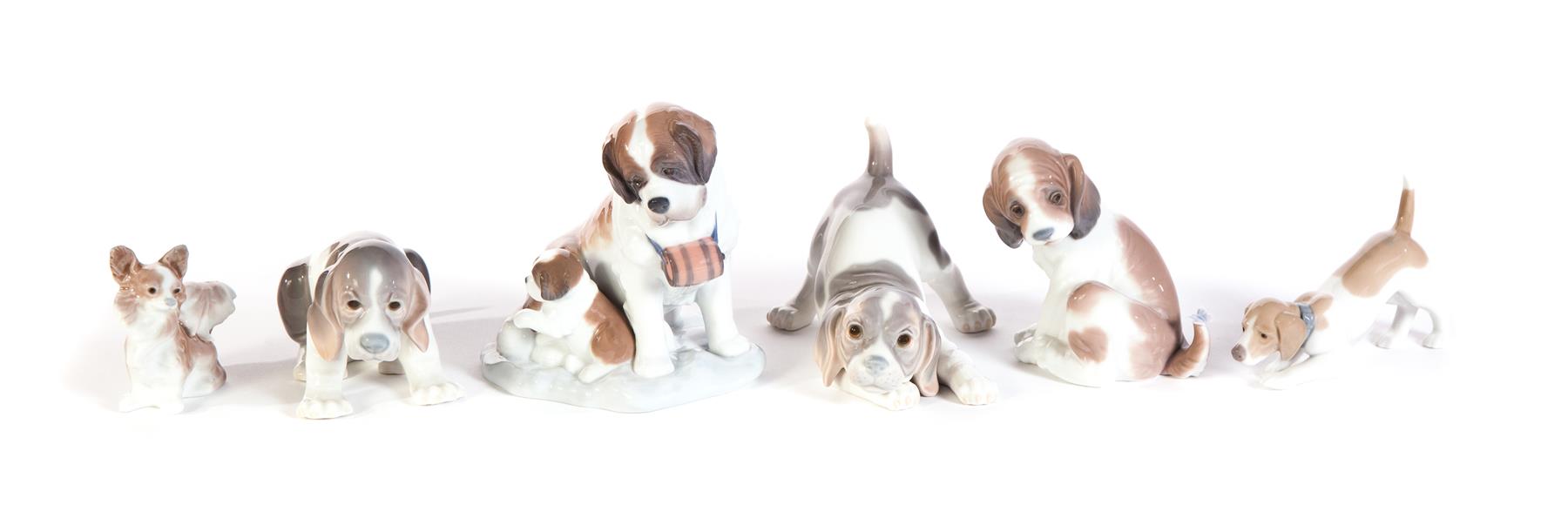 Appraisal: SIX LLADRO FIGURES OF DOGS Spain th century High glaze