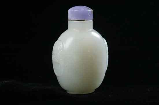 Appraisal: CHINESE CELADON JADE SNUFF BOTTLE th century Of flattened ovoid