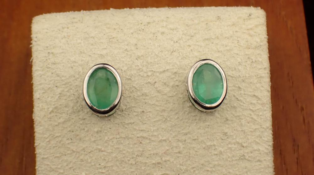 Appraisal: PAIR OF EMERALD AND FOURTEEN KARAT GOLD EAR STUDS each