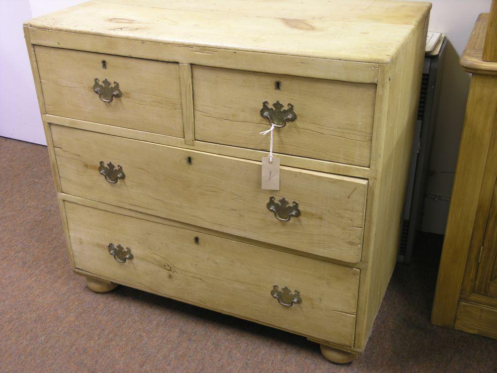 Appraisal: A late Victorian stripped pine chest of two short and