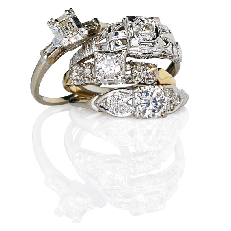 Appraisal: FOUR DIAMOND AND GOLD ENGAGEMENT RINGS Condition Report Diamonds K-M