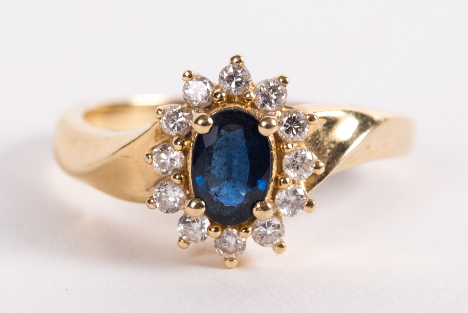 Appraisal: A Sapphire and Diamond Ring center oval sapphire approximately ct