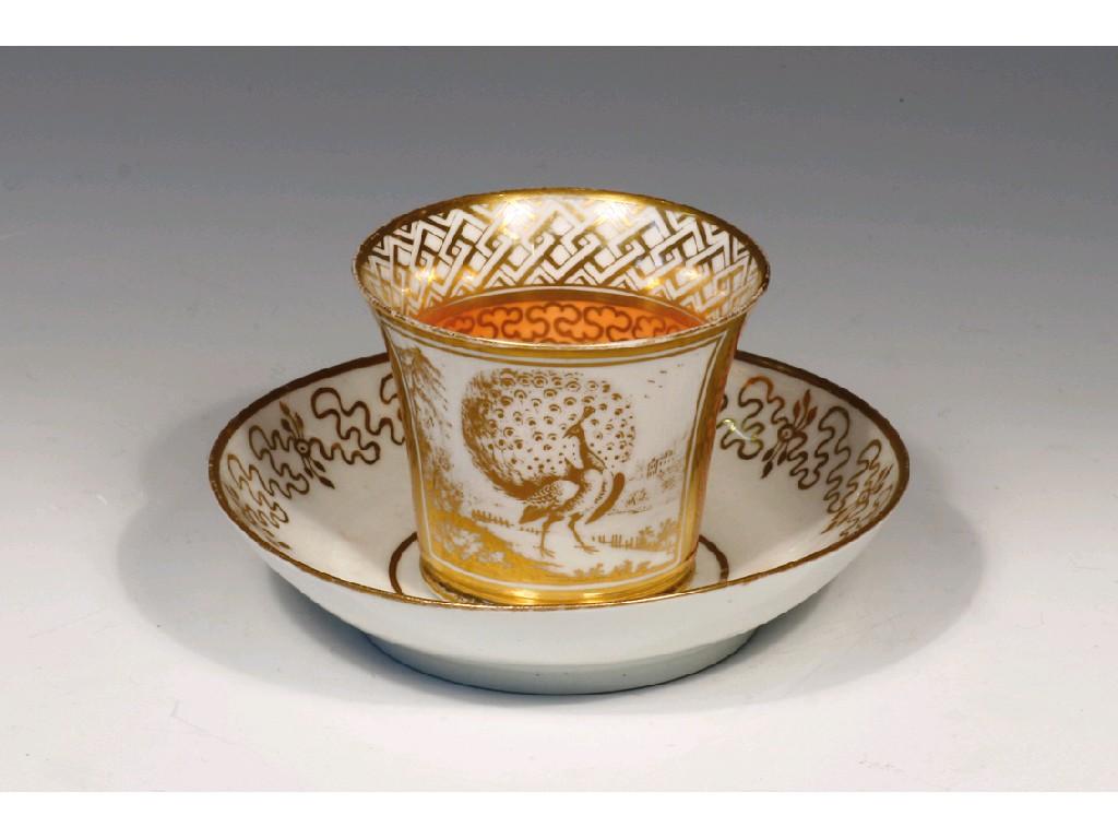 Appraisal: A CHAMBERLAINS WORCESTER COFFEE CUP AND SAUCER the tangerine ground