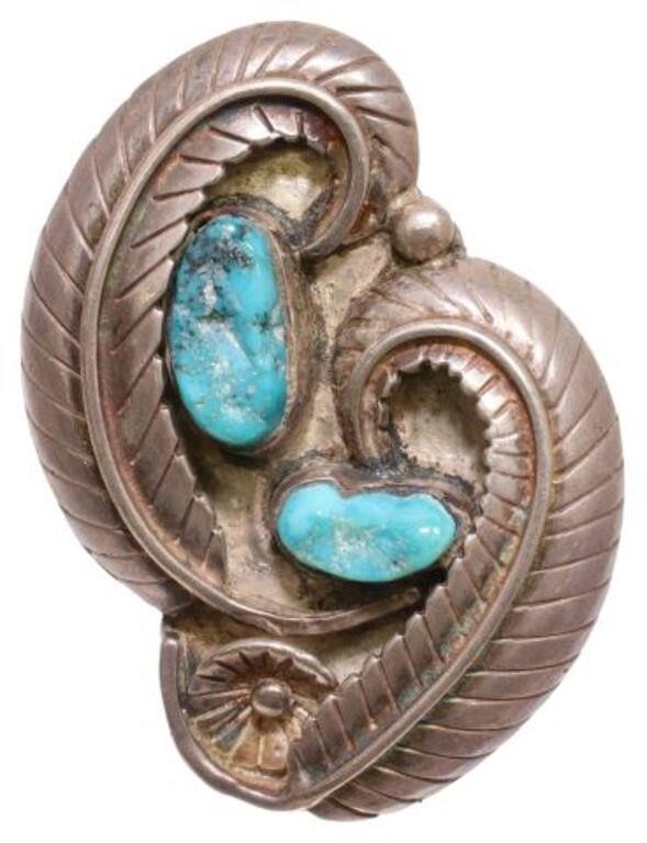 Appraisal: Southwest silver content unknown ring featuring two bezel-set turquoise stones