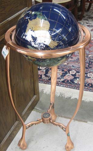 Appraisal: GEMSTONE FLOOR GLOBE a globe with dark blue oceans surrounding