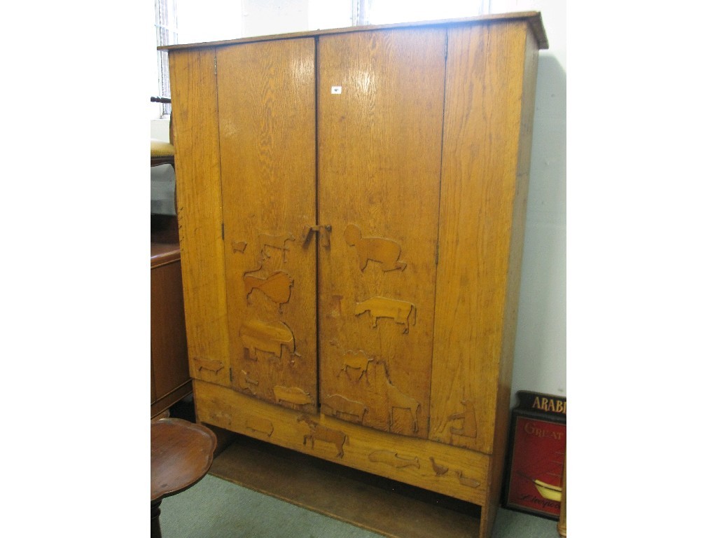 Appraisal: Continental oak nursery wardrobe