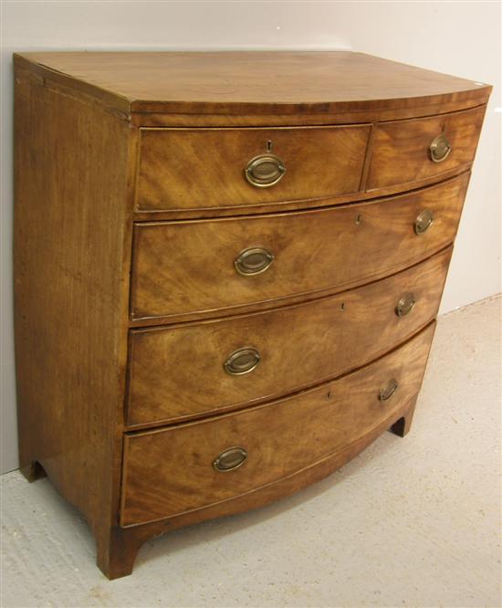 Appraisal: George III mahogany bow-fronted chest of two short over three