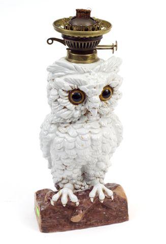 Appraisal: CONTINENTAL POTTERY FIGURAL OWL OIL LAMP the white glazed bird