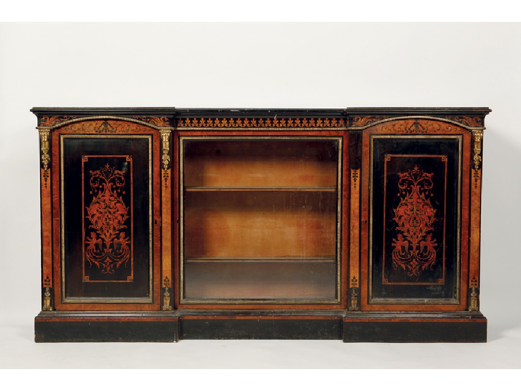 Appraisal: A LATE VICTORIAN EBONISED AND MARQUETRY CREDENZA with an inverted