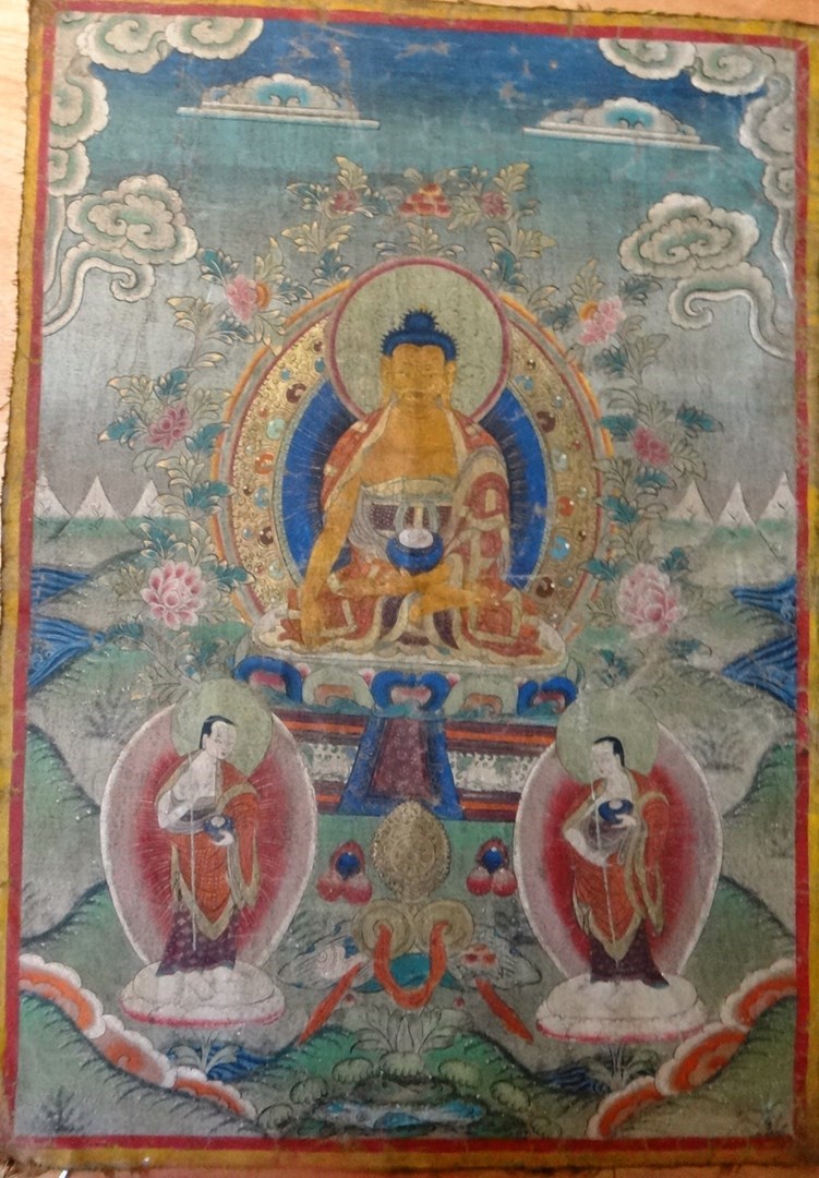 Appraisal: A Tibetan thankgka painting on cloth of Buddha th seated