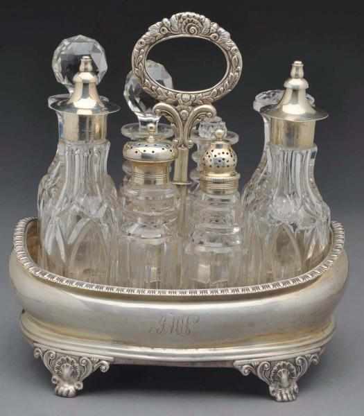 Appraisal: An English Silver Cruet Stand London maker's mark TJ Oval