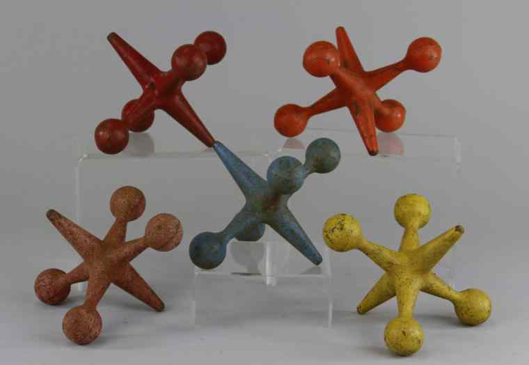 Appraisal: SET OF FIVE CAST IRON JACKS Cast iron painted in