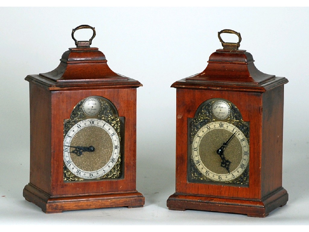 Appraisal: PAIR OF TWENTIETH CENTURY REPRODUCTION WALNUT CARRIAGE CLOCKS in the