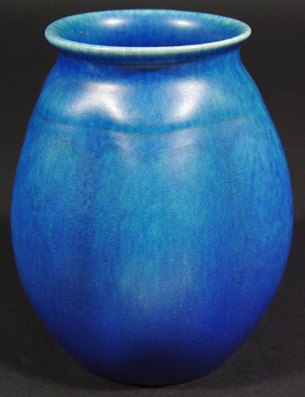 Appraisal: Pilkingtons Lancastrian fluted pottery vase decorated with a mottled blue