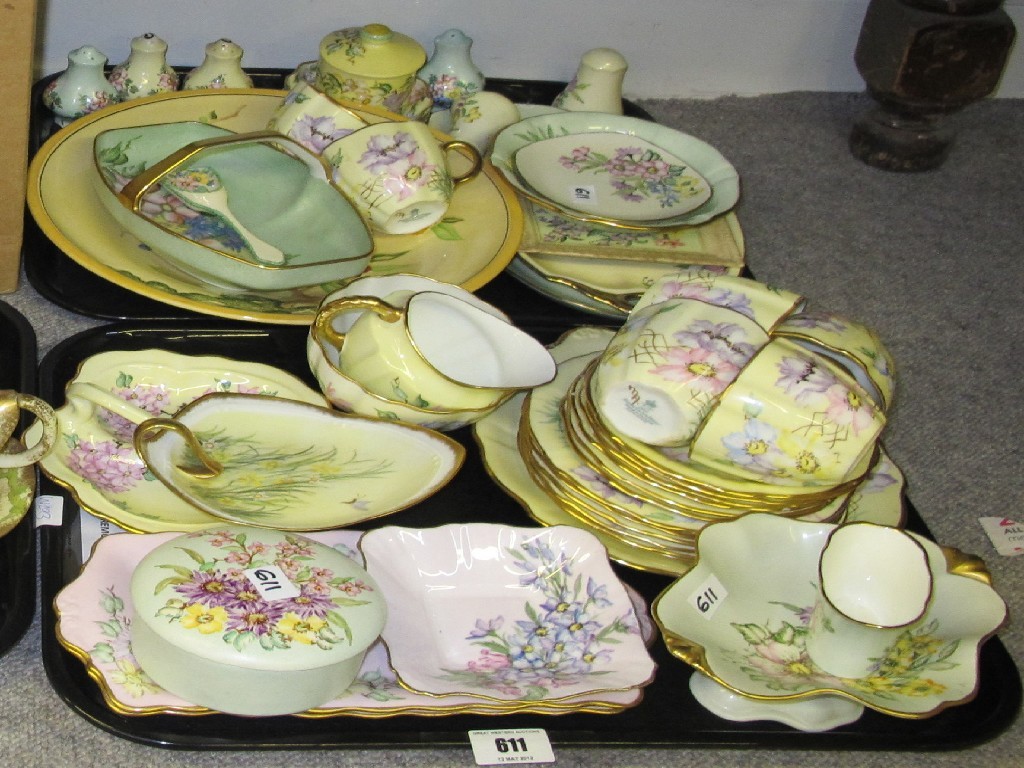 Appraisal: Two trays of lady artist painted teawares