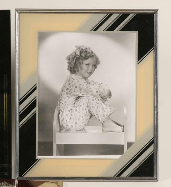 Appraisal: Seven Art Deco frames including Hollywood Shirley Temple studio photos