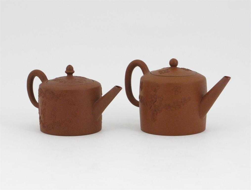 Appraisal: Two Staffordshire red stoneware teapots and covers