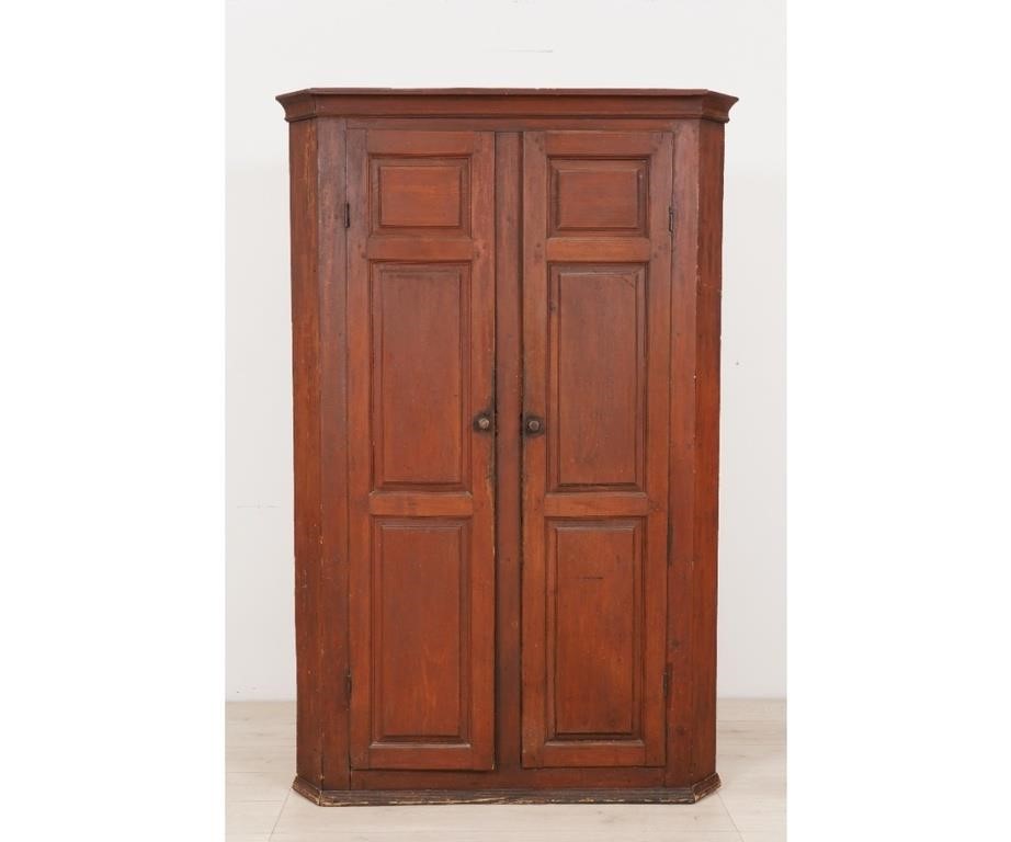 Appraisal: Pennsylvania pine red painted blind door corner cupboard circa with