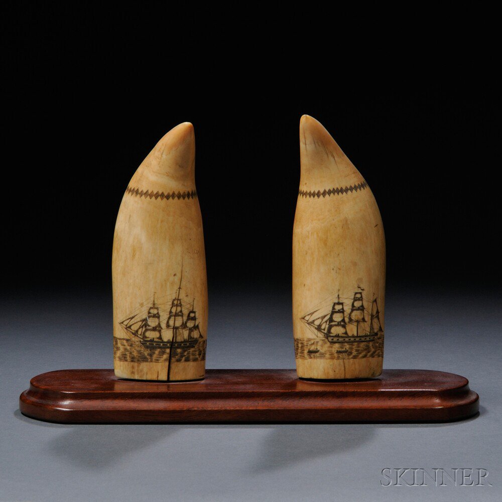 Appraisal: Matched Pair of Scrimshaw Whale's Teeth Decorated with Panoramic Whaling