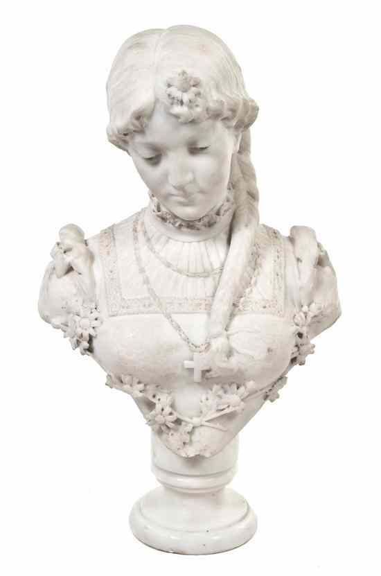 Appraisal: A Continental Carved Marble Bust depicting a lady with braided