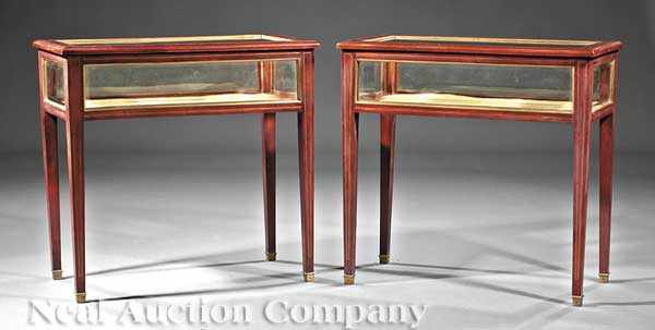 Appraisal: A Pair of Baltic-Style Carved Vitrine Tables brass string inlay