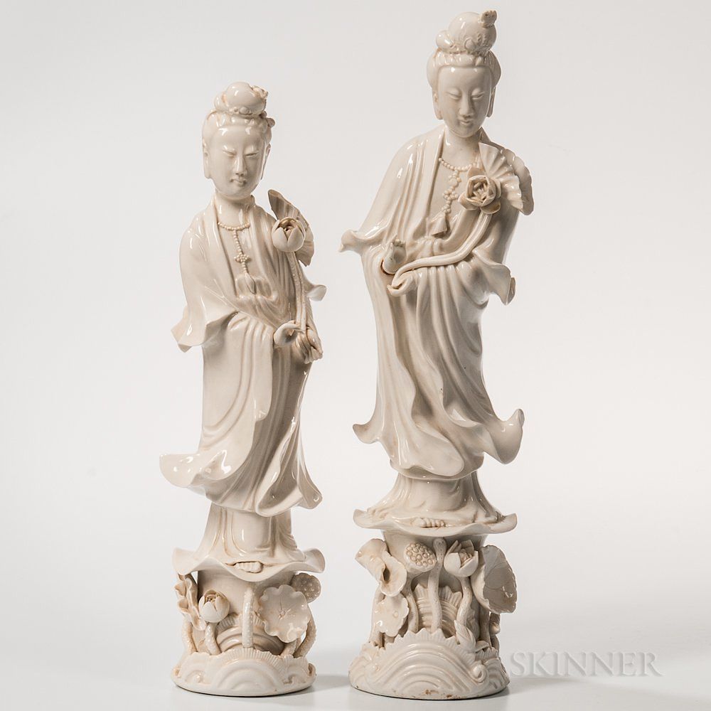 Appraisal: Two Blanc-de-Chine Figures of Guanyin Two Blanc-de-Chine Figures of Guanyin