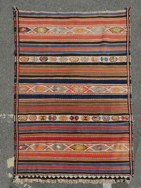 Appraisal: A TRIBAL FLAT WEAVE KELIM RUG decorated horozontal bands of