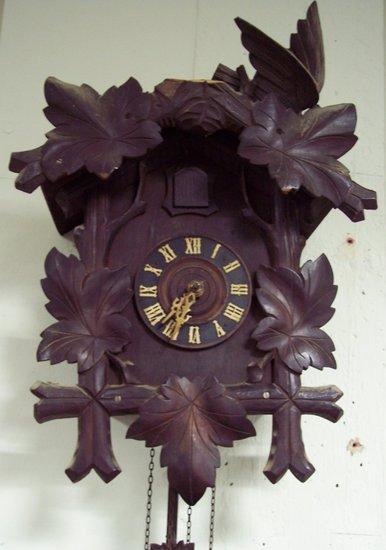 Appraisal: An early th Century Black Forest cuckoo clock in a