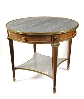 Appraisal: A Louis XVI style mahogany and brass mounted gueridon the