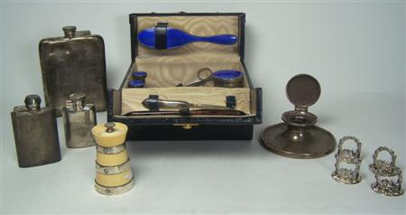 Appraisal: A collection of items to include a leather dressing set