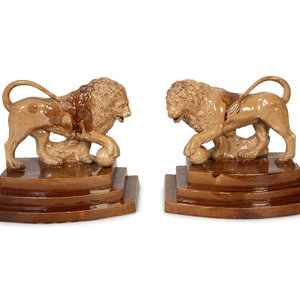 Appraisal: A Pair of English Glazed Pottery Medici Lions CIRCA Height