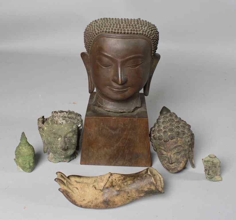 Appraisal: SIX THAI BRONZE SCULPTURAL ELEMENTS Including a bust of Buddha