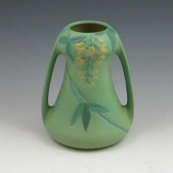 Appraisal: Weller Fru Russet handled vase with yellow flowers and matte