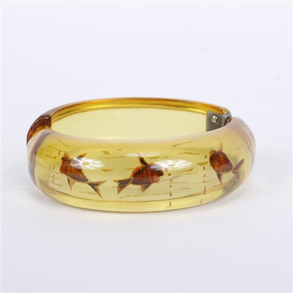 Appraisal: Bakelite Apple Juice Reverse Carved Fish Bowl Clamper Bangle Bracelet