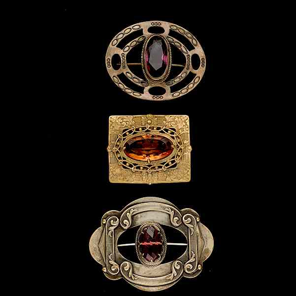 Appraisal: Trio of Large Metalic Brooches A grouping of three Metal