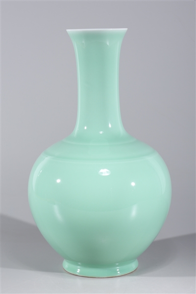 Appraisal: Chinese celadon glazed porcelain vase with six-character Qianlong mark to