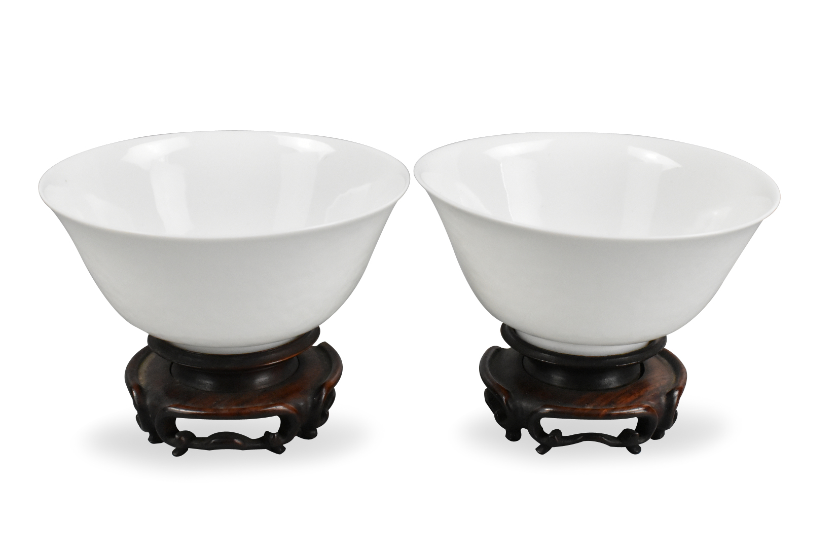 Appraisal: A pair of white glazed bowls From a short foot